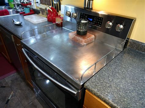 8" to 27. . Stainless steel stove cover